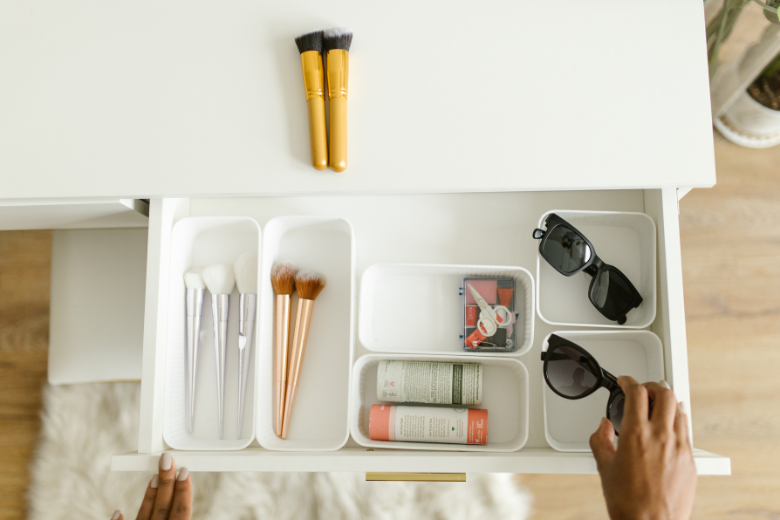 a-person-organizing-the-drawer